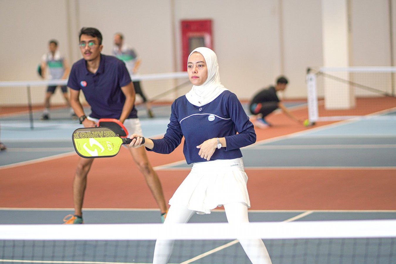 A Tactical Guide to Playing Pickleball With a Weaker Partner